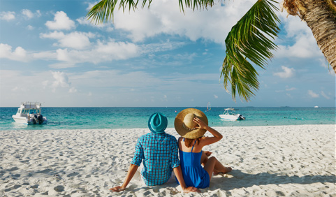 Couple relaxing at the beach